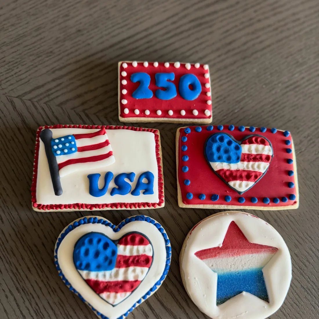 Cookie set with a 250 plaque, an American flag, flag hearts and a star